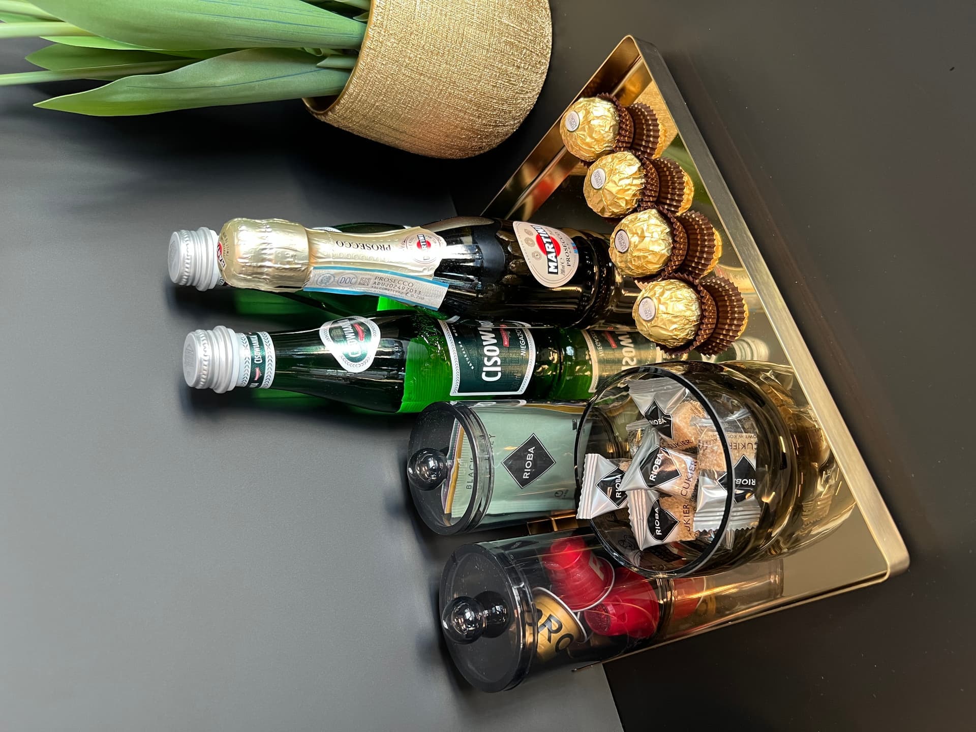 Welcome tray with mini Prosecco, Martini, Ferrero Rocher and treats