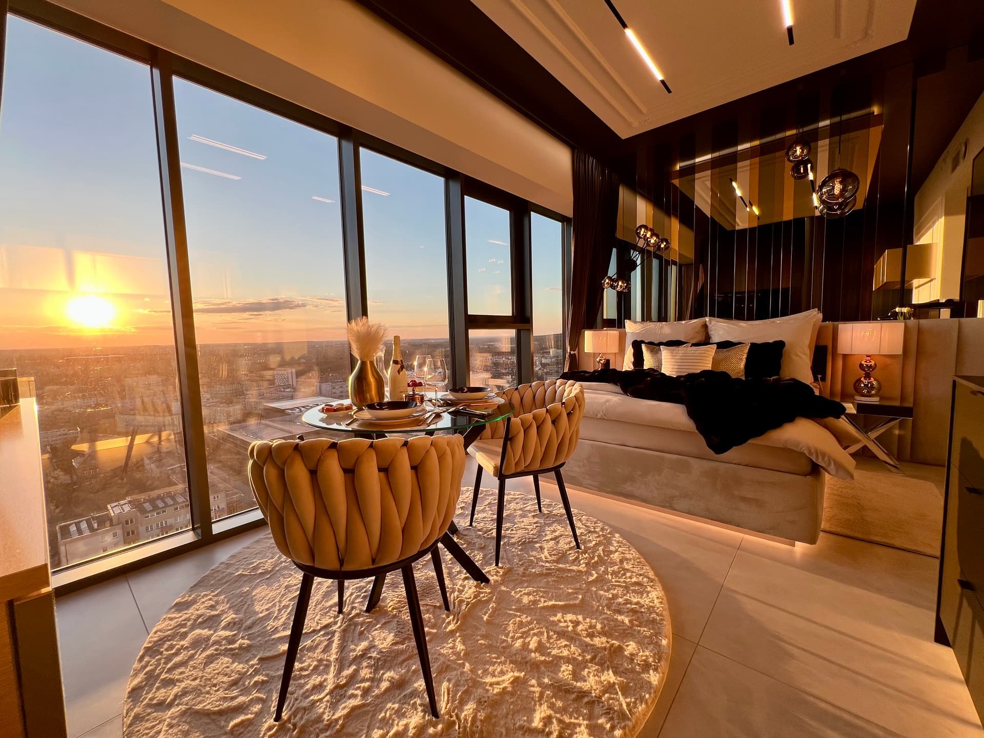 Suite wide angle with golden sunset light streaming in